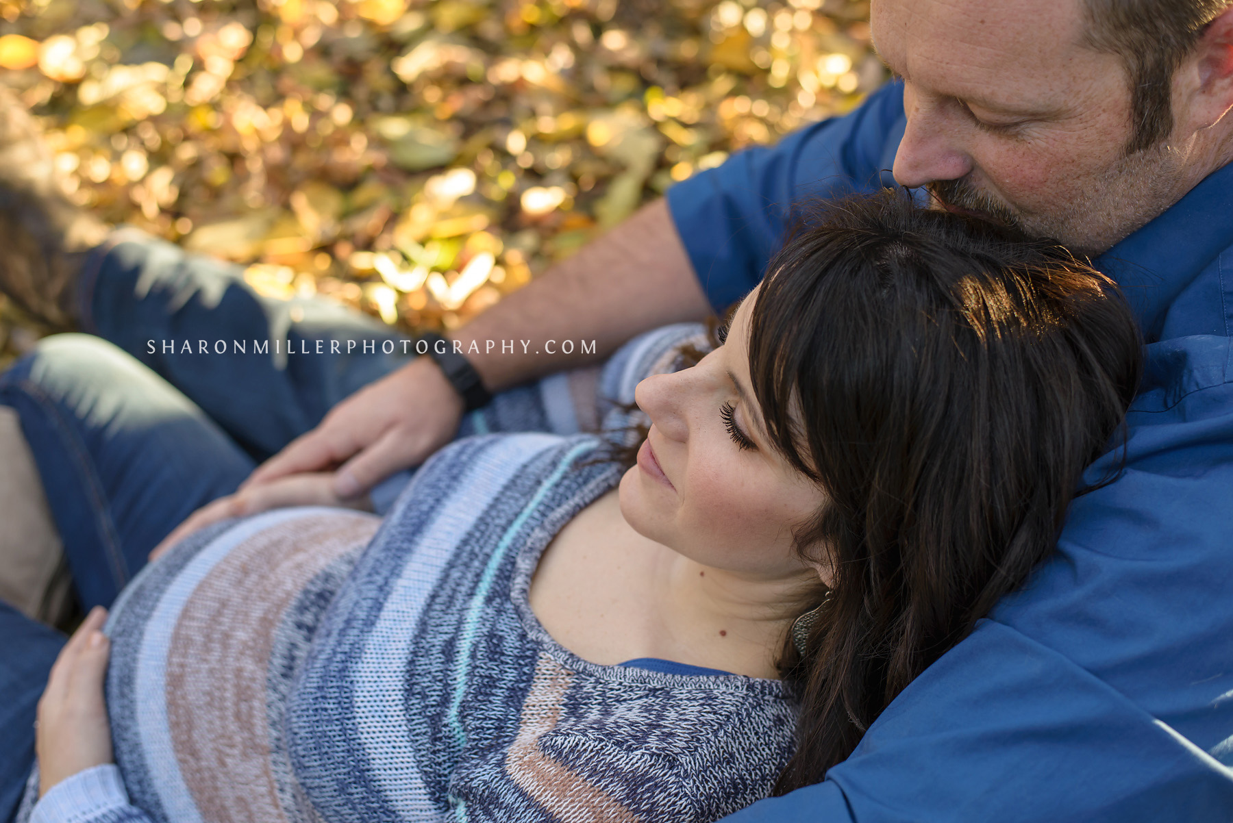  maternity couple photographed from above at Grapevine Botanical Gardens