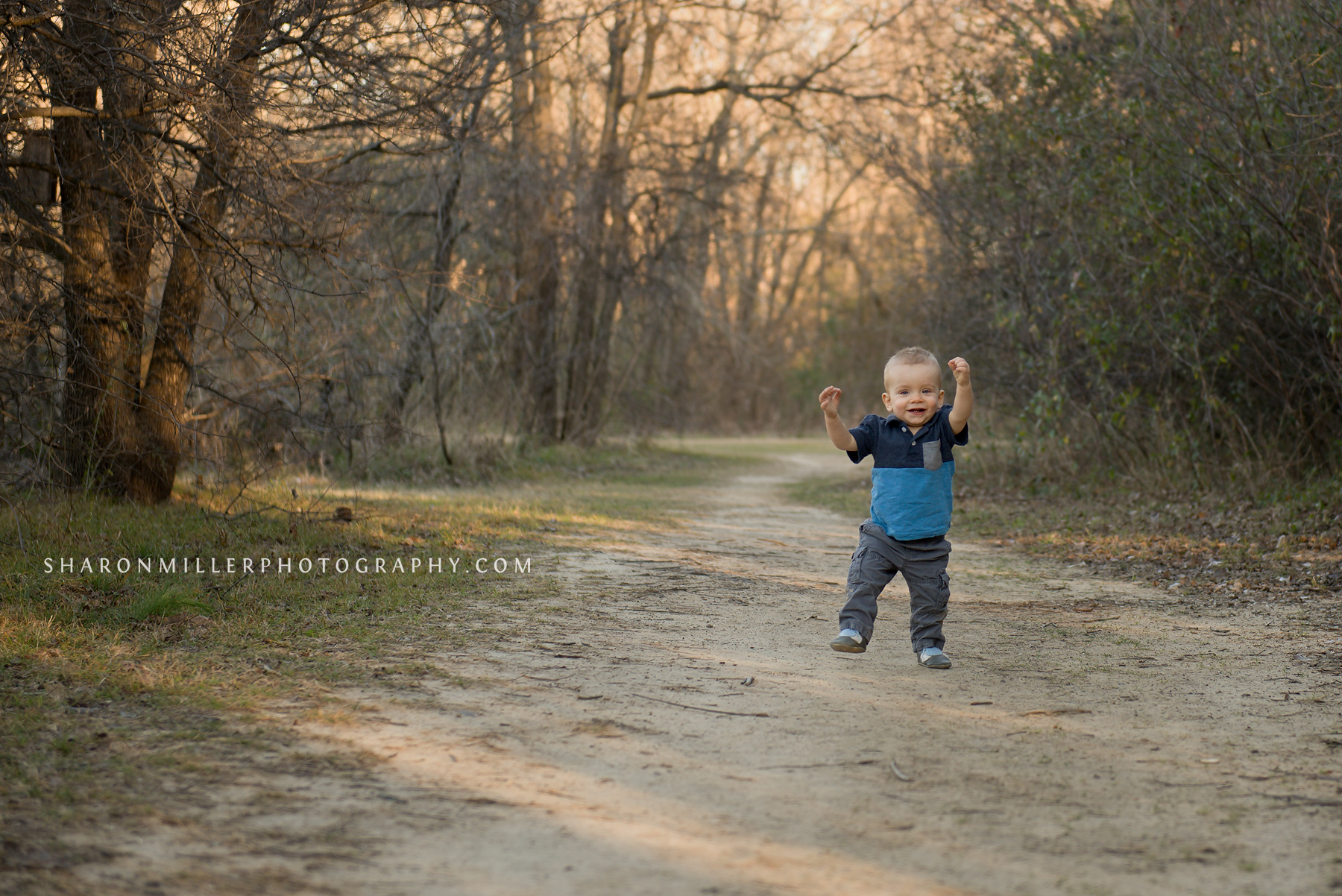 one year old walking on Colleyville Nature Center trail